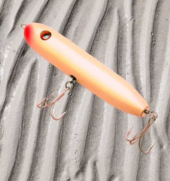Walk-the-dog lure's features a side-to-side swimming action, imitating a wounded baitfish struggling at the surface. 