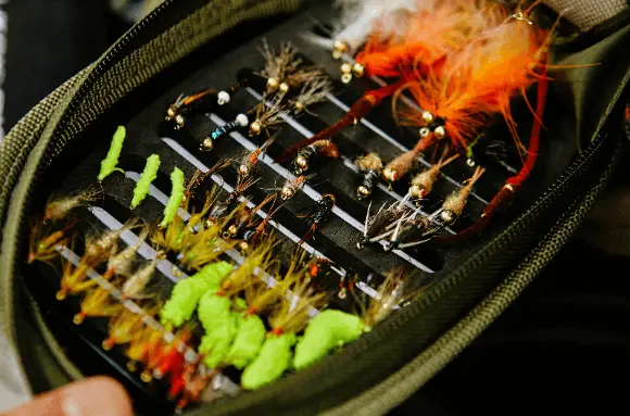 Streamers and lures are very important in trout fishing. They mimic the larger food that trout love, like small fish, crayfish, and leeches. It's like giving them their favorite three-course meal.